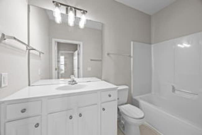 Building Photo - Charming 2 Bed + Office Condo in the Heart...