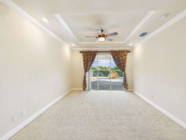 Building Photo - Luxury Lakefront Pool Home in Tesoro - Move-in Ready with Premium Inlcusions