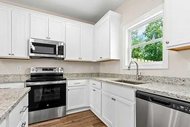 Building Photo - New Townhome in Hartbrook!