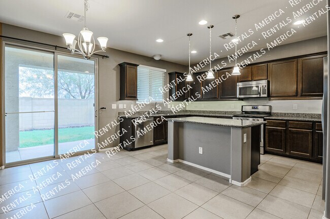 Building Photo - 12114 W Rowel Rd