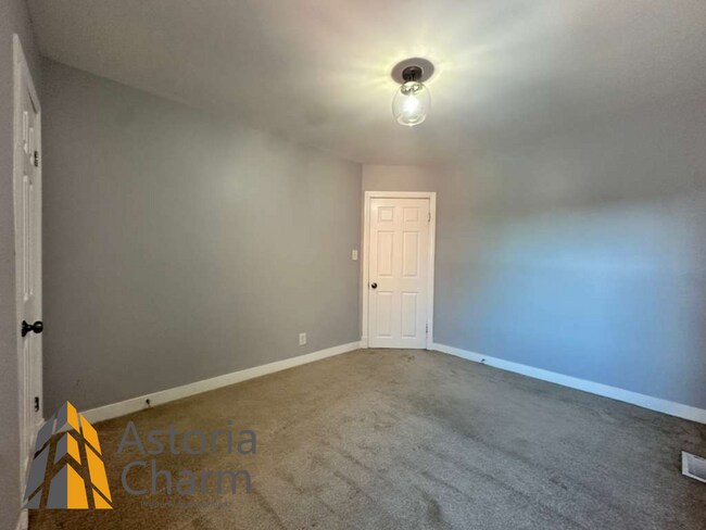 Building Photo - Spacious 3BR/2BA Home with Finished Baseme...