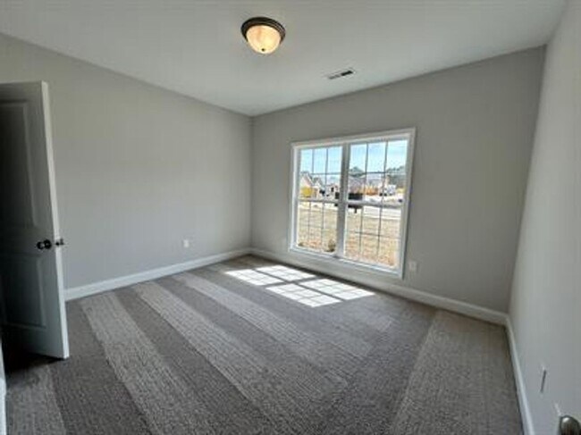 Building Photo - Relax & Unwind in This Peaceful 4 Bedroom ...