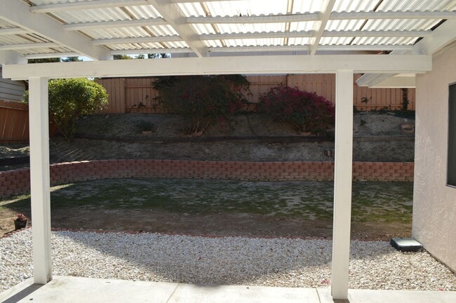 Building Photo - Four Bedroom, Two Bathroom Single Story Home With Two Car Garage