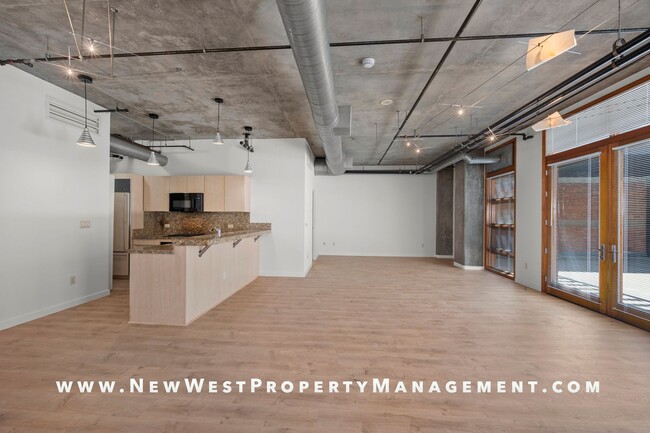 Building Photo - Expansive East Village loft at Parkloft, a...