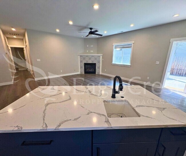 Building Photo - Contemporary Home With A Covered Patio & Quartz Countertops