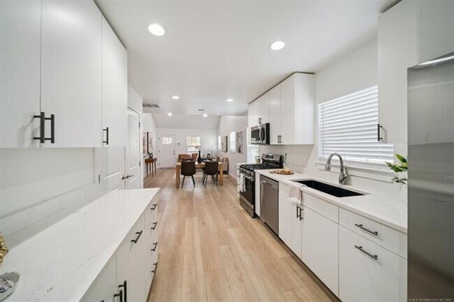 Building Photo - Gorgeous updated and modern open layout