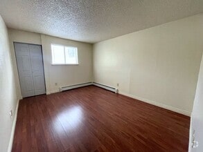 Building Photo - East Anchorage Condo with Laminate Floorin...
