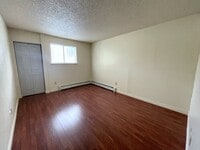 Building Photo - East Anchorage Condo with Laminate Floorin...