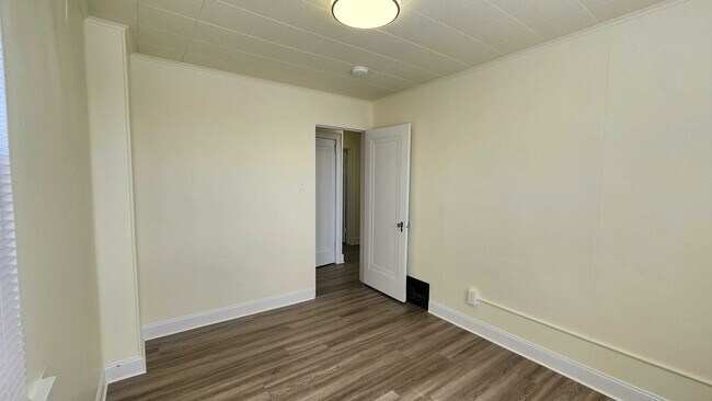 Building Photo - Updated 3BR 1.5 Bath house now available!