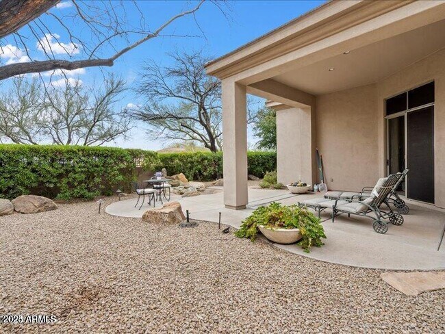 Building Photo - 10695 E Caribbean Ln