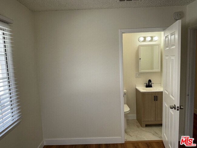 Building Photo - 10631 Tinker Ave