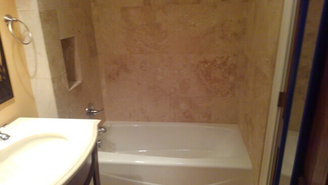 Tile tub and shower - 547 E Grand River Ave