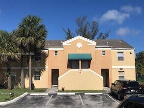 Building Photo - 2421 NW 56th Ave