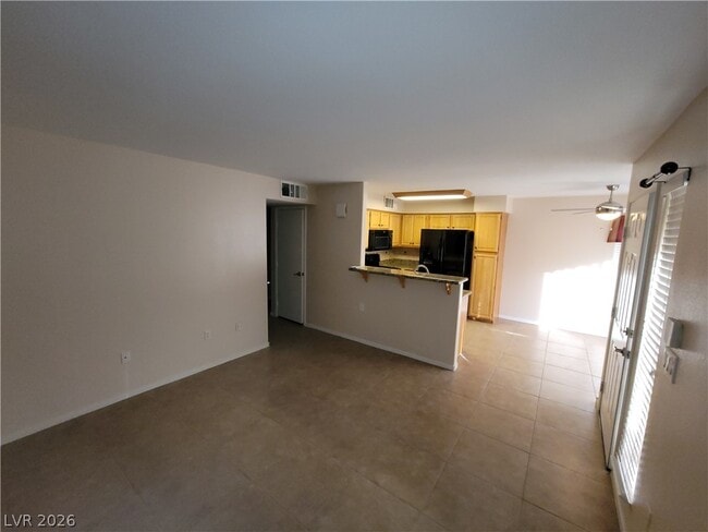 Building Photo - 5710 E Tropicana Ave