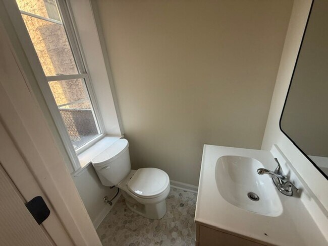 Building Photo - 3-Bedroom Port Richmond Home with Central Air and Expansive Backyard