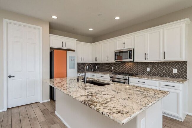 Building Photo - Amazing 4BR 2.5BA Home w/ 3-Car Tandem Garage • Pool Access • Yard w/ Fire Pit in Saguaro Trails