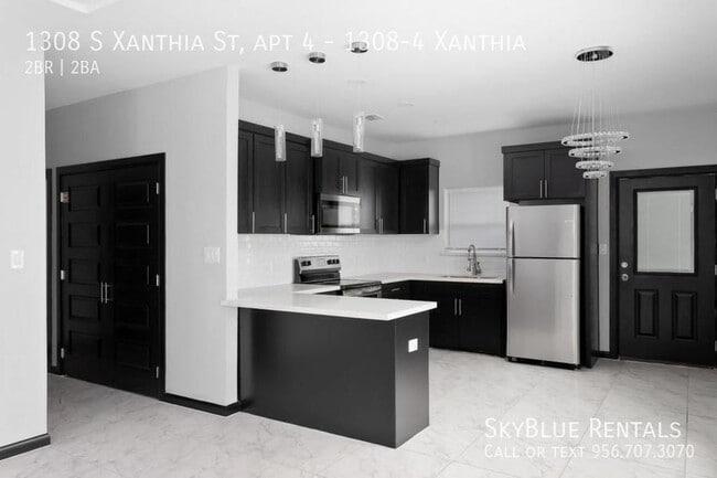 Building Photo - 1308 S Xanthia St