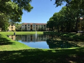 Building Photo - Water view! great 2nd floor 1bed/1bath in desirable Pinnacle at Carrollwood condo
