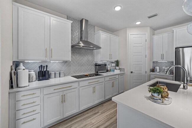 Building Photo - "Luxurious Furnished Home with 4-Bed, 3-Bath, Swim Spa Fenced Yard Golf Cart steps to the beach!"
