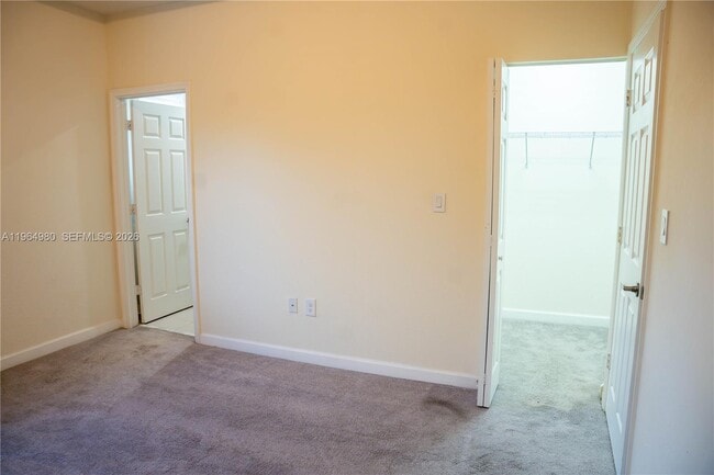 Building Photo - 11091 W 32nd Ln