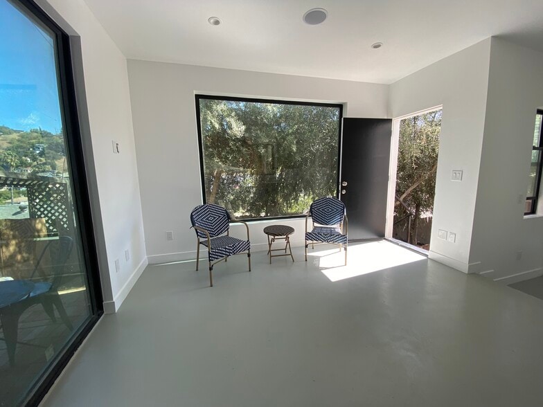 Open Living and Kitchen space with high-end windows! - 4435 Radium Dr