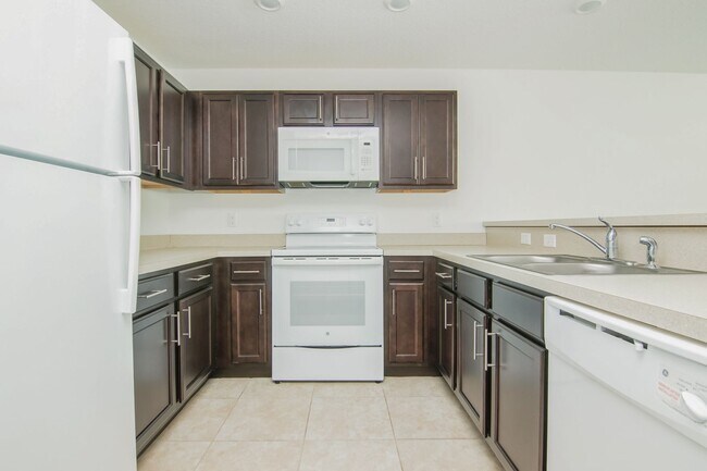 Building Photo - MOVE IN BY JUNE 15TH and RECEIVE THE REST ...