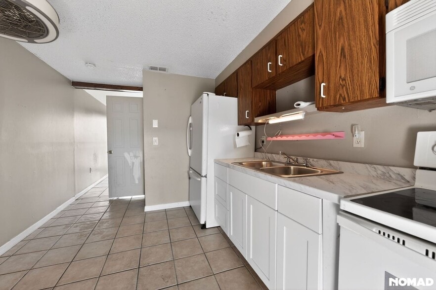 Building Photo - 12255 Van Loon Ave