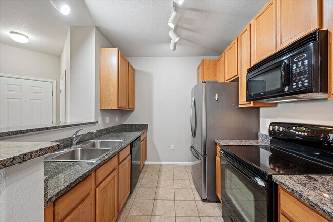 Building Photo - Pet-Friendly 2BR Condo | Private Balconies, Fireplace & Resort-Style Amenities