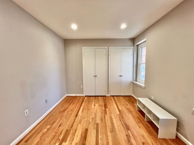 Building Photo - Beautiful and updated 4 BR 2.5 BA with garage and lovely yard!