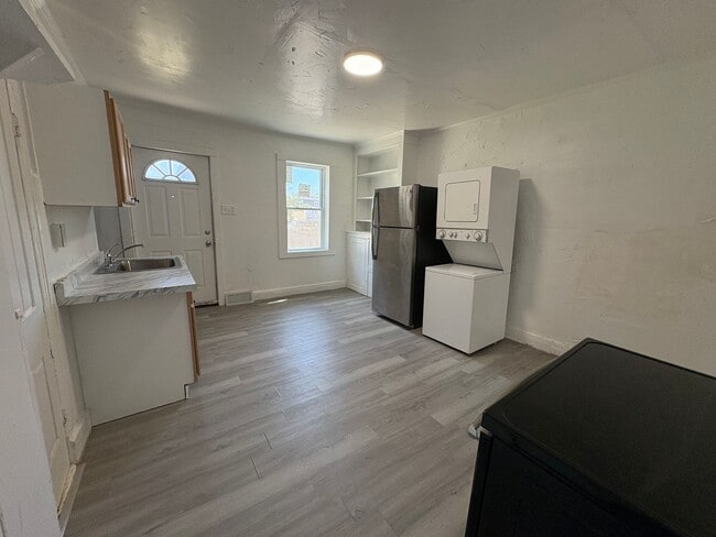 Building Photo - Newly Renovated Three-Bedroom, One Bathroom Row Home - Special Available – Contact Our Office for...