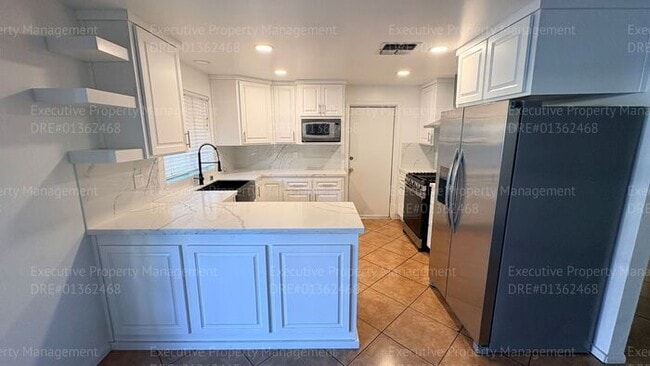 Building Photo - 3 bedroom 2 bathroom home on a corner lot with extra fenced parking.