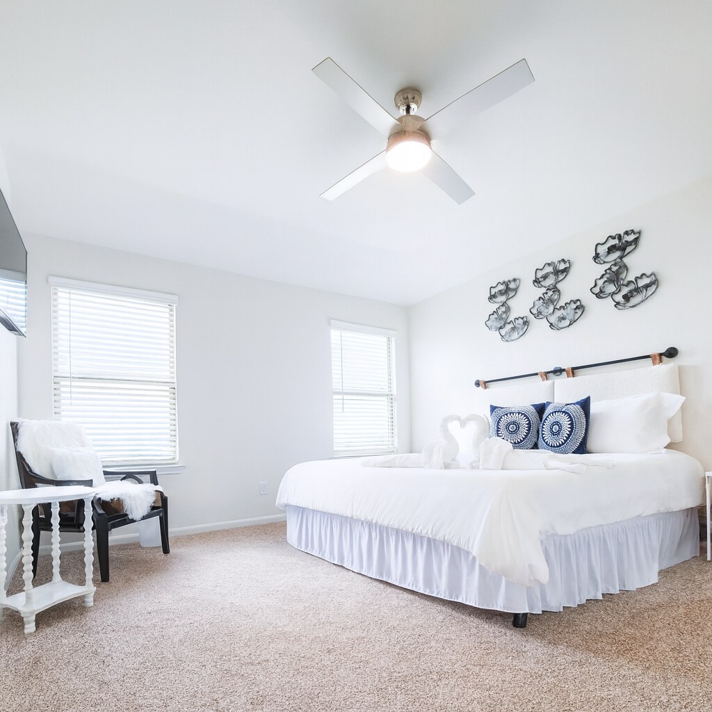 Spacious Main Bedroom. This home is offered unfurnished. Staging furniture shown is not included. - 13810 Enzo Gate