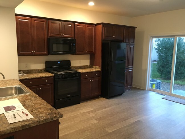 Kitchen w back porch - 6020 Swanville Rd