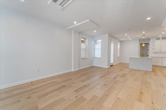 Building Photo - 36-34-36-11 11th St