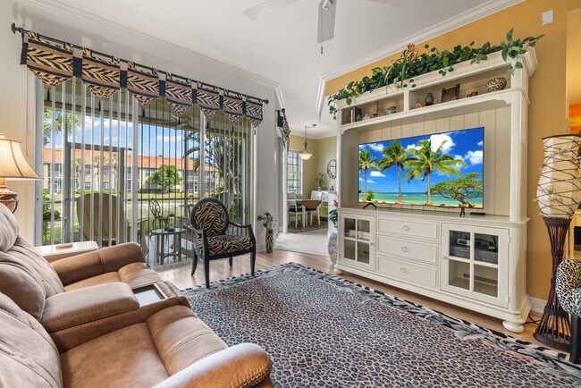 Building Photo - Experience Bell Tower Park. GATED ground floor 2 Bed 2 Bath Den 1 Car Garage Condo.