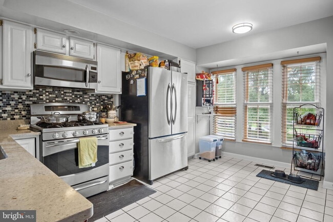 Building Photo - Stunning Ashburn Townhome with Endless Appeal