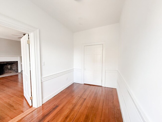 Building Photo - Renovated One-Bedroom Gem Steps from Train, Dining & Shopping