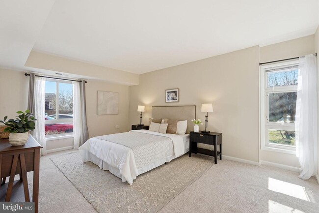 Building Photo - Welcome to this rarely available and beautifully updated ground-level condo offering the perfect ...