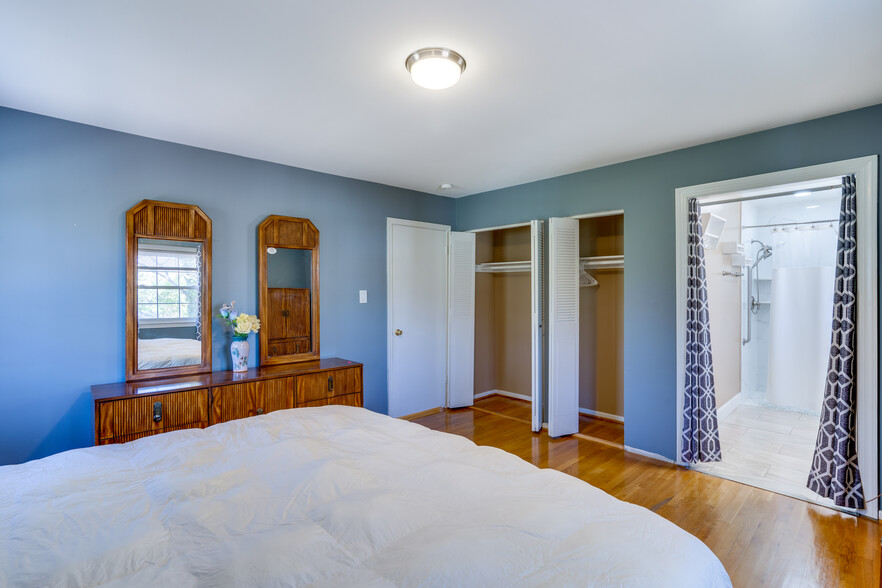 Primary Bedroom with Ensuite Bathroom - 9215 Cherrytree Dr