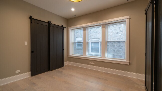 Building Photo - Newly Rehabbed 3-bedroom, 2-bath Gem with In-Unit Washer/Dryer! Discover Uptown Living.