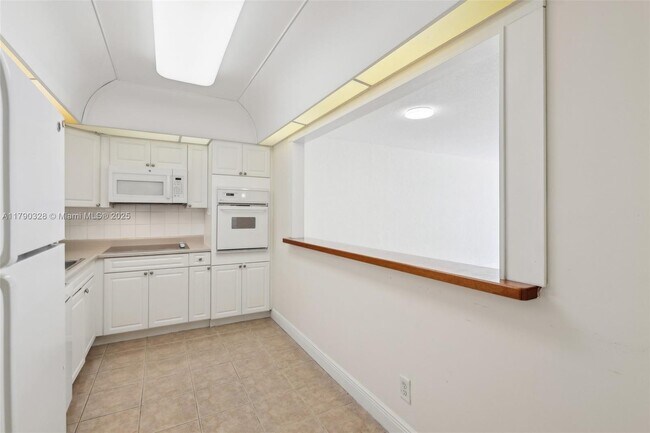 Building Photo - 19390 Collins Ave