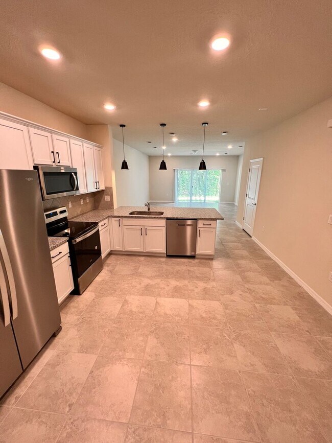 Building Photo - Move In ASAP!! - Brand New 3 bedroom 2.5 bath Townhouse for rent in Kissimmee, FL.