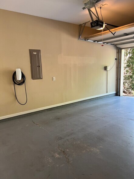 Garage with Tesla charger - 440 Wembley Cir
