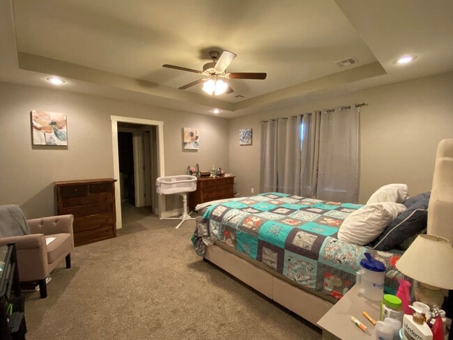 Building Photo - FENCED BACKYARD! BONUS ROOM/OFFICE! SAFE ROOM! THREE CAR GARAGE