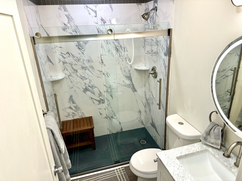 Bathroom with carrara marble. - 3038 E St