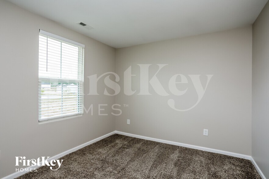 Building Photo - 14 Windchime Ct