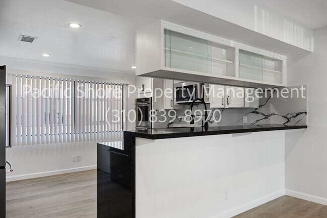 Building Photo - Lush and Lavish Three Bedroom Neatly Tucked Away In The Villa Vallarta Townhouse Community