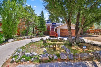 Building Photo - Charming 3 Bed Mountain Retreat | Wood Beams, Fireplace & Deck