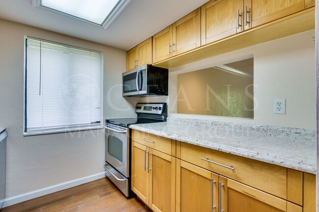 Building Photo - WATERFRONT TRAILS TOWNHOME