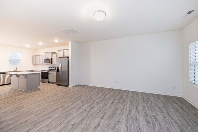 Building Photo - Charming 3-Bedroom End Unit Townhome Near Jack Alexander Blvd - MOVE IN SPECIAL